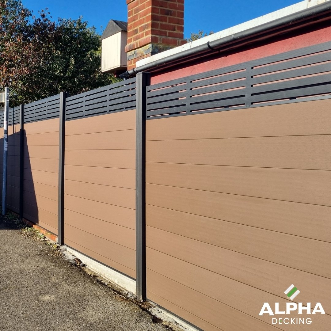 Oak-effect composite fencing in a garden setting