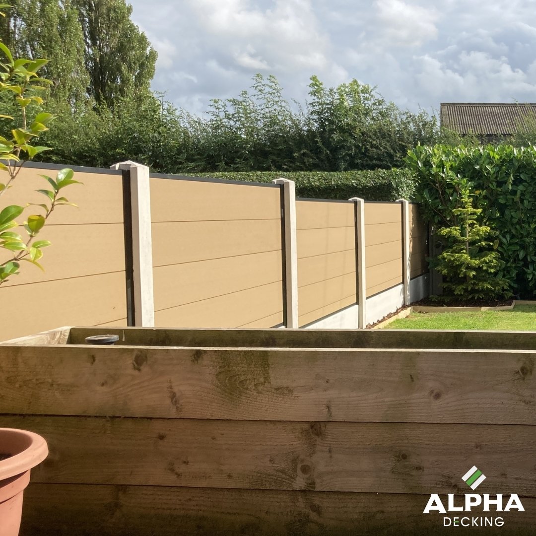 Teak-effect composite fencing installation